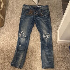 Men's Blue Distressed Jeans by ice cream